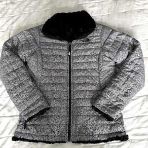 The North Face Mossbud Swirl Black and White Speckle Reversible Jacket